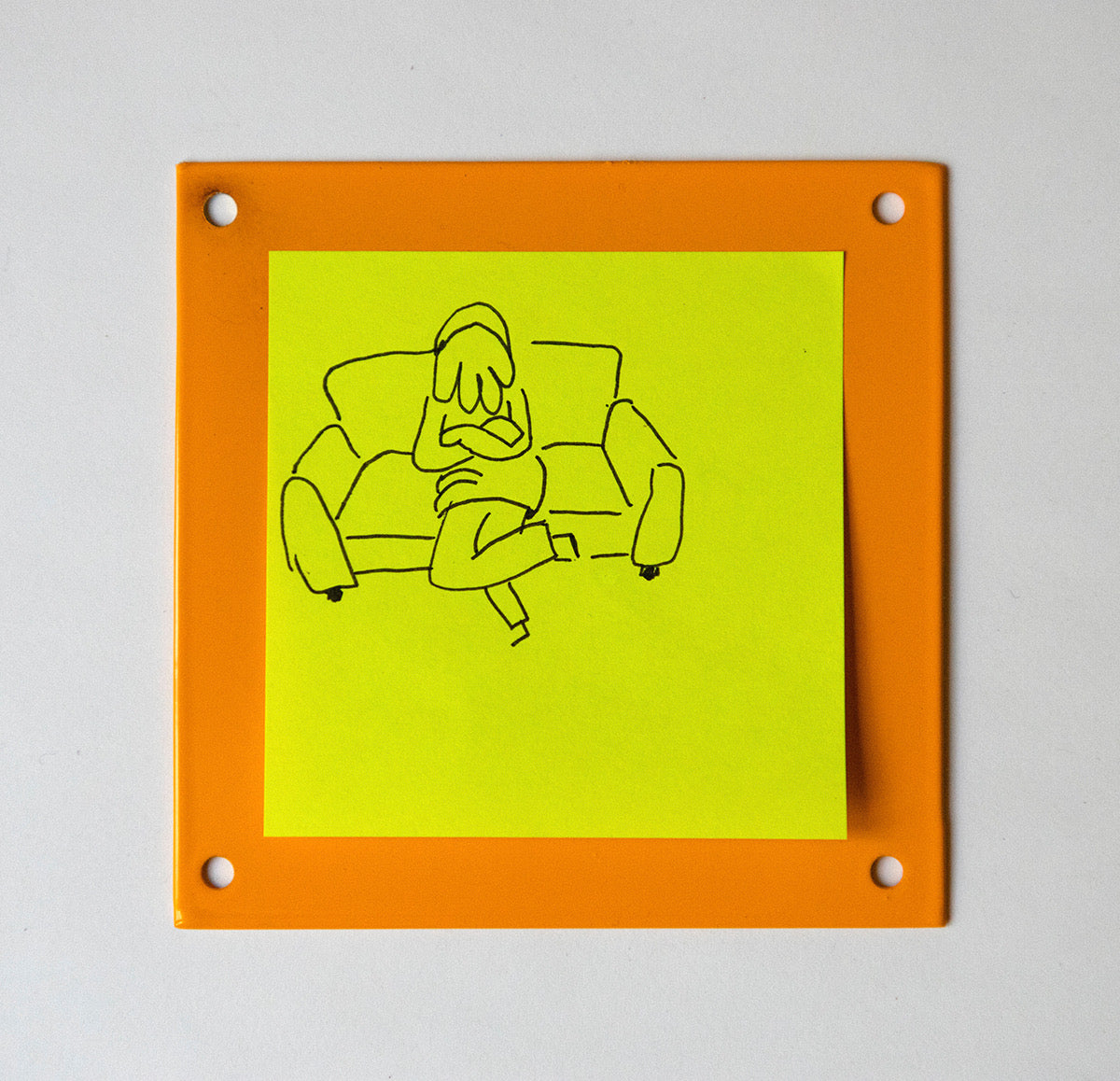 Yung Jake - sitting with legs crossed on couch, 2019